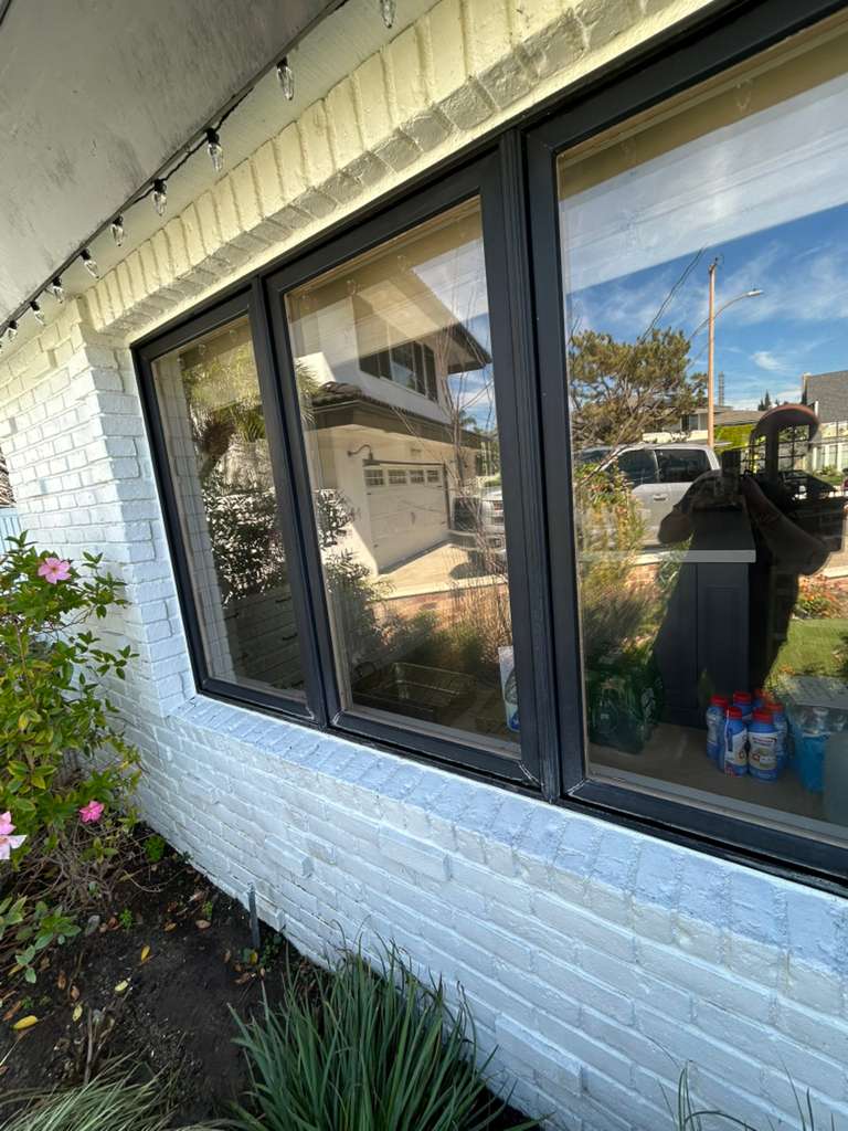 Window after professional cleaning service by Badger Cleaning Co in Orange County